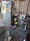 Seladora e tampadora em inox rotativa de potes plsticos Maqmundi 1200 potes por hora