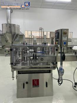 Envasadora dosadora volum�trica com seladora e tampadora em inox Delgo 2000 potes por hora